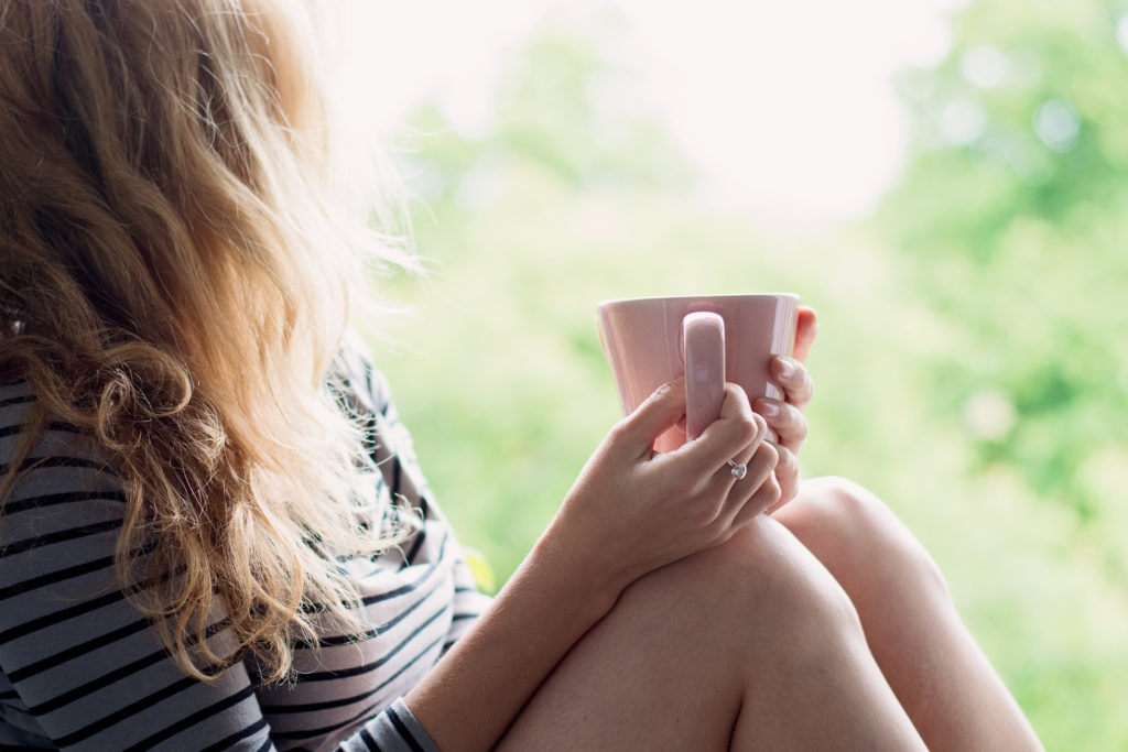 Women with cup of tea relaxing | why-a-retreat | mums-retreat